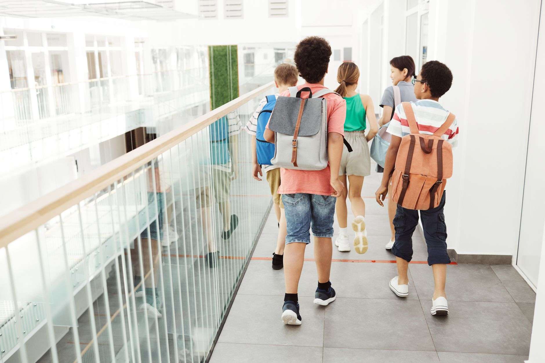 Students moving through a school hallway between classes