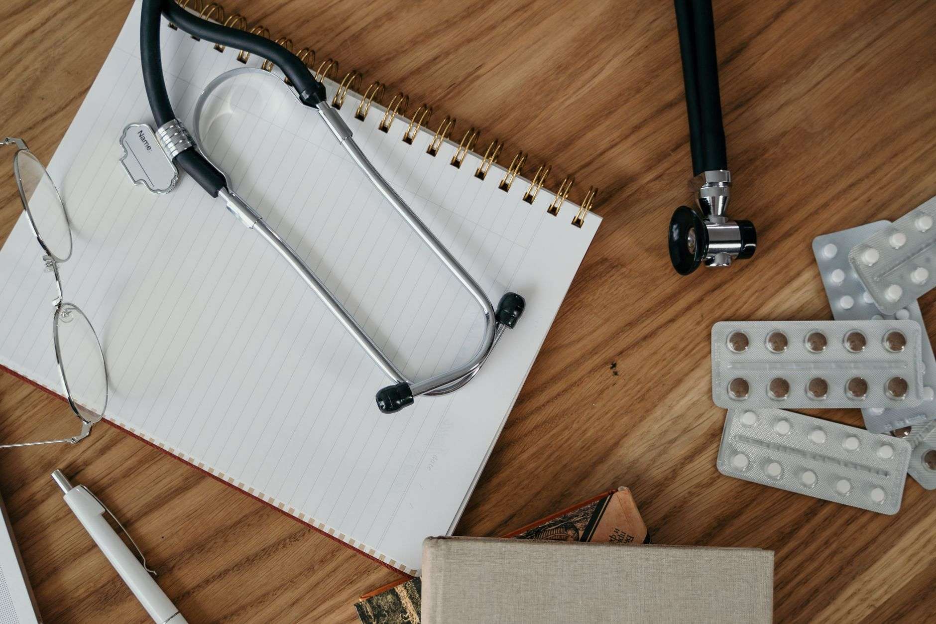 A stethoscope resting on a desk