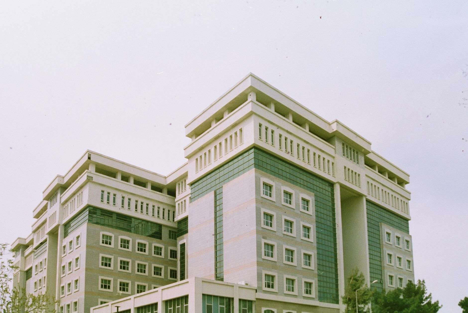 A modern municipal government building exterior, illustrating a new consolidated police and courts facility