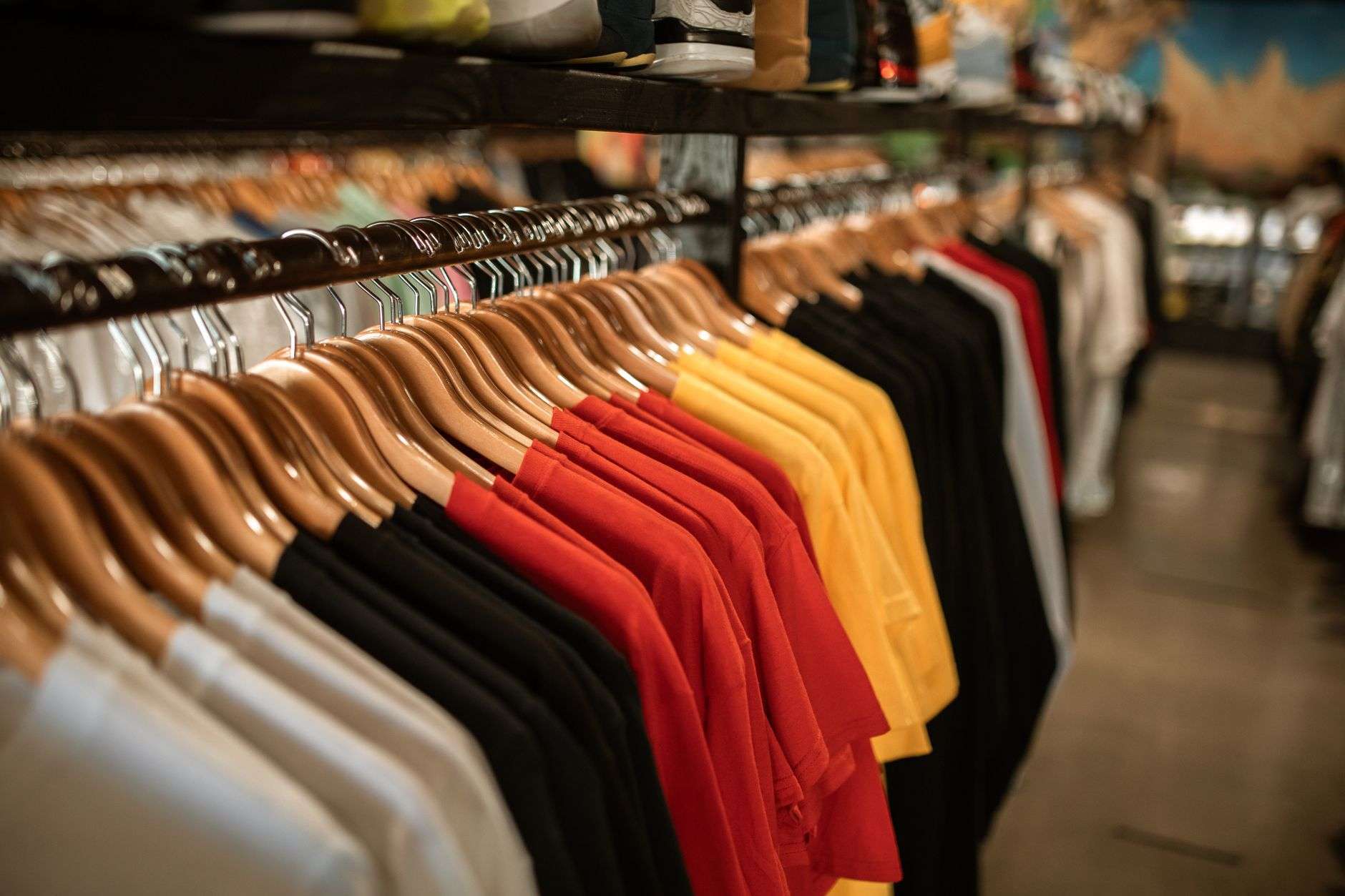 Folded school spirit apparel and merchandise on display
