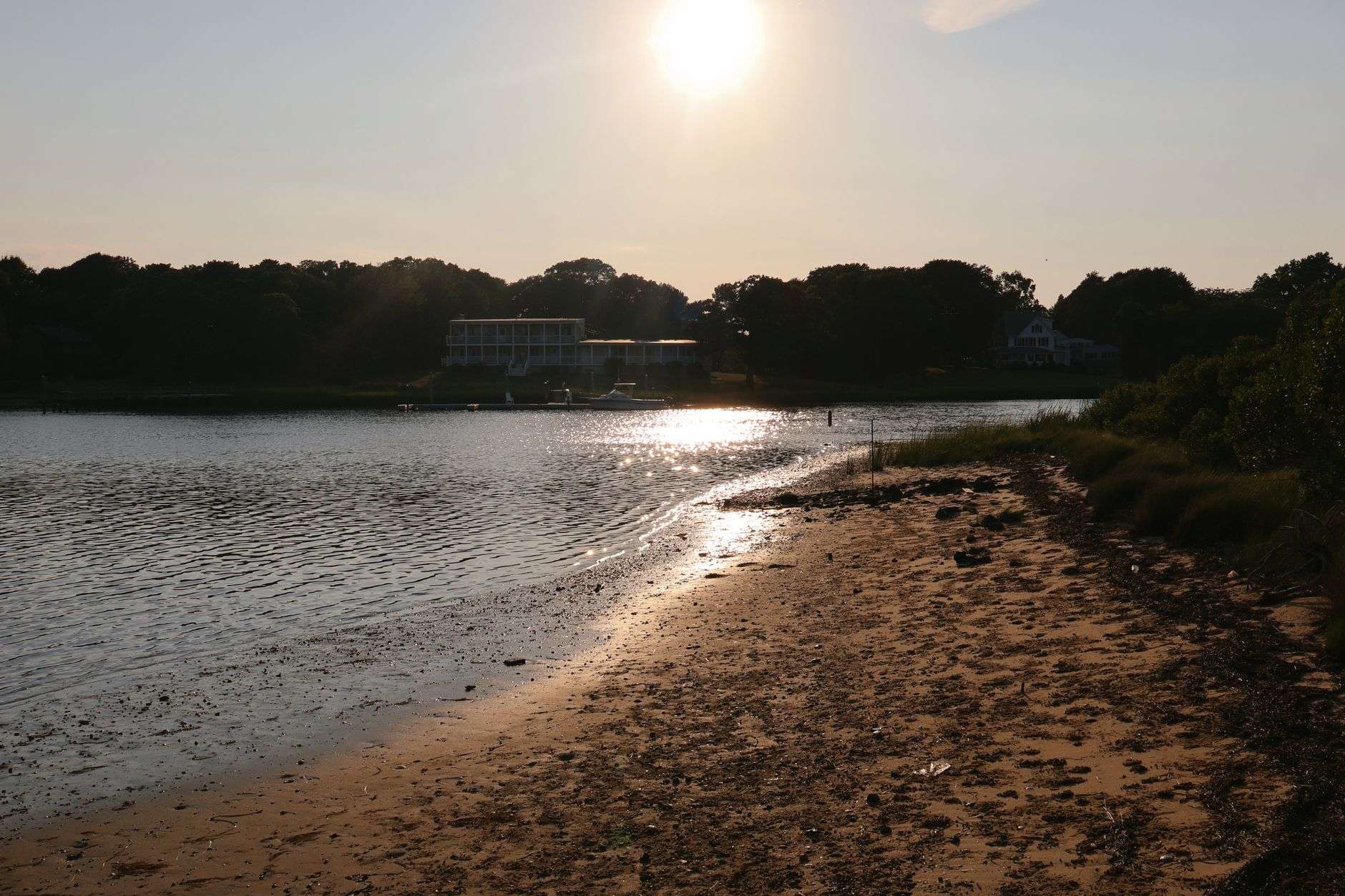 Calm coastal bay water along a shoreline