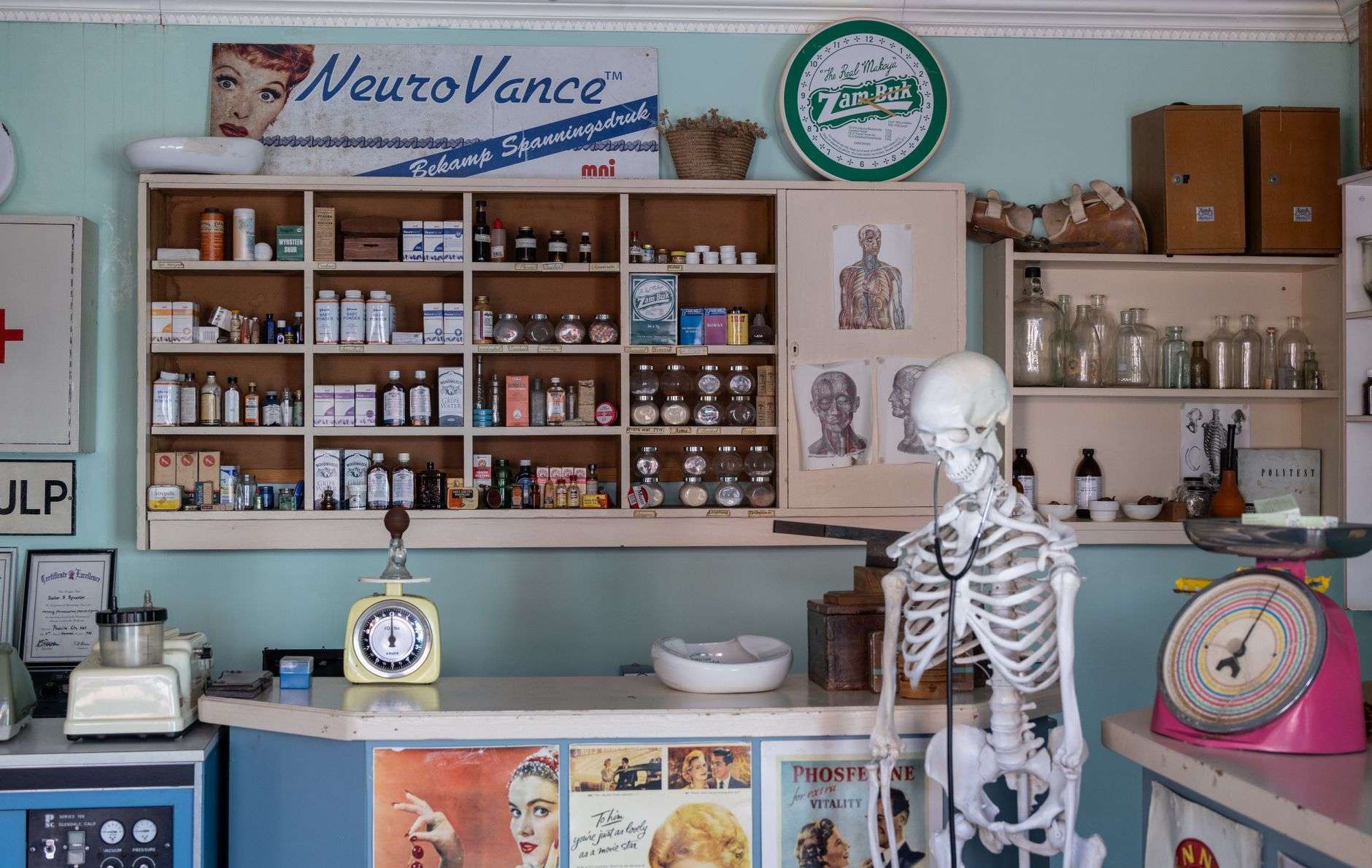 Shelves of packaged medical and first aid supplies in a clinical setting