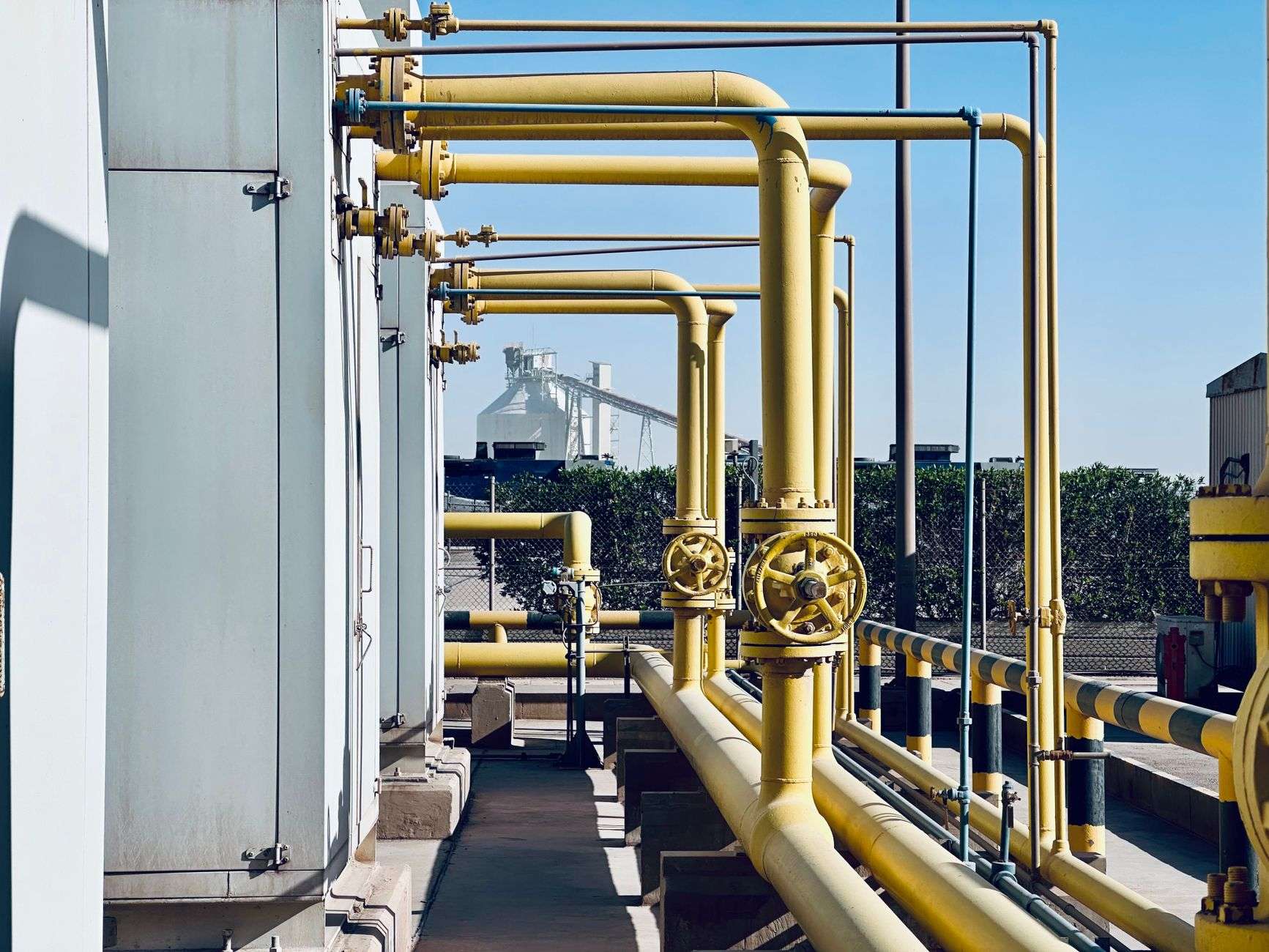 Industrial valves and piping in a processing facility