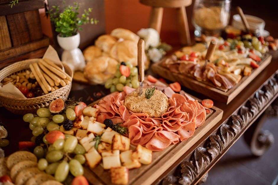 Catered buffet table set with southern dishes and serving platters