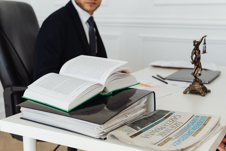 Shelves of law books in a professional office setting