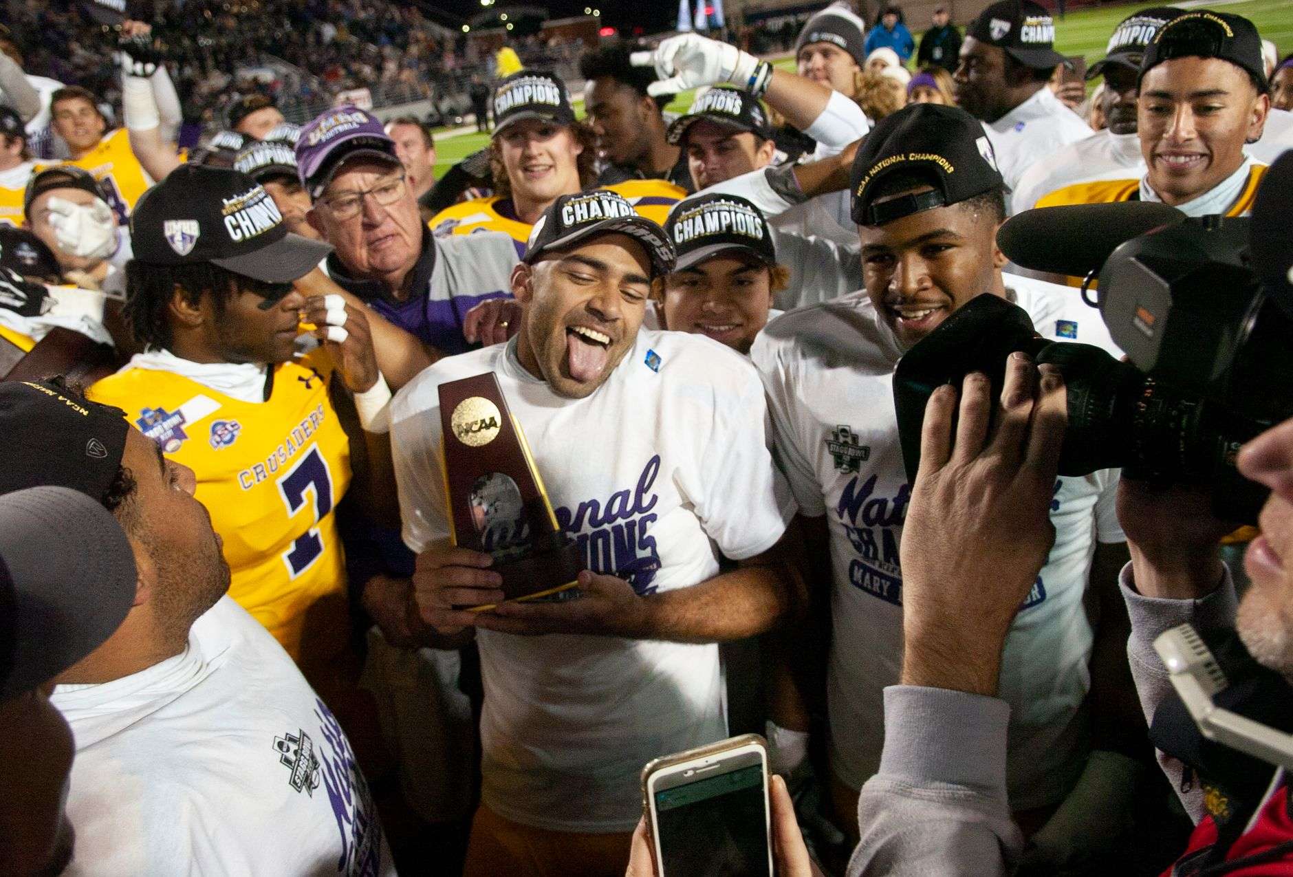 Championship trophy displayed in a college athletics setting