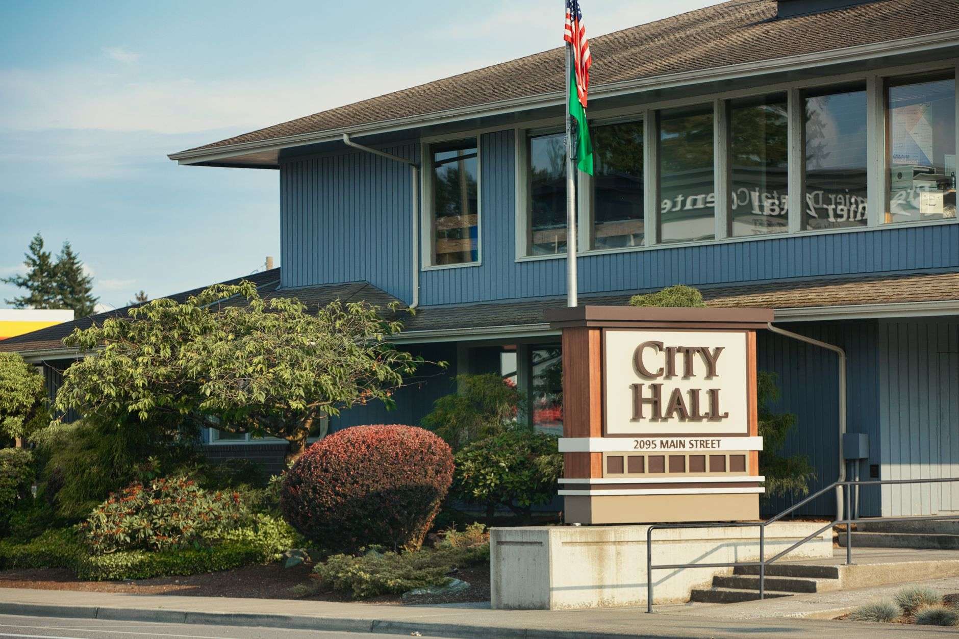 The exterior of a small town municipal building and town hall