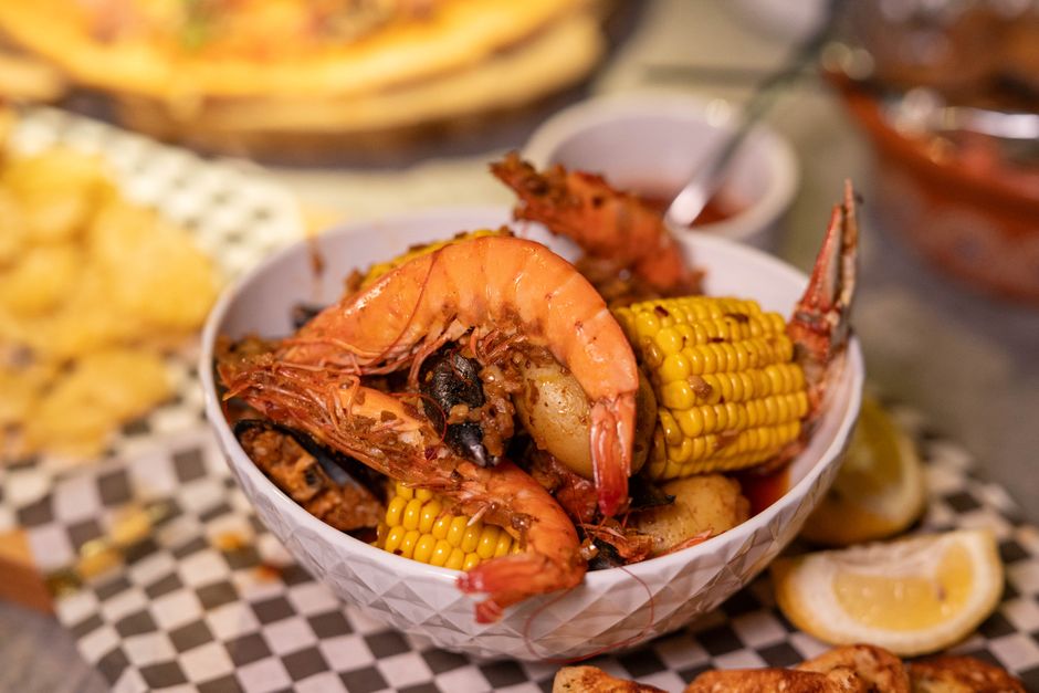 Plated Southern dishes on the table of a downtown restaurant dining room