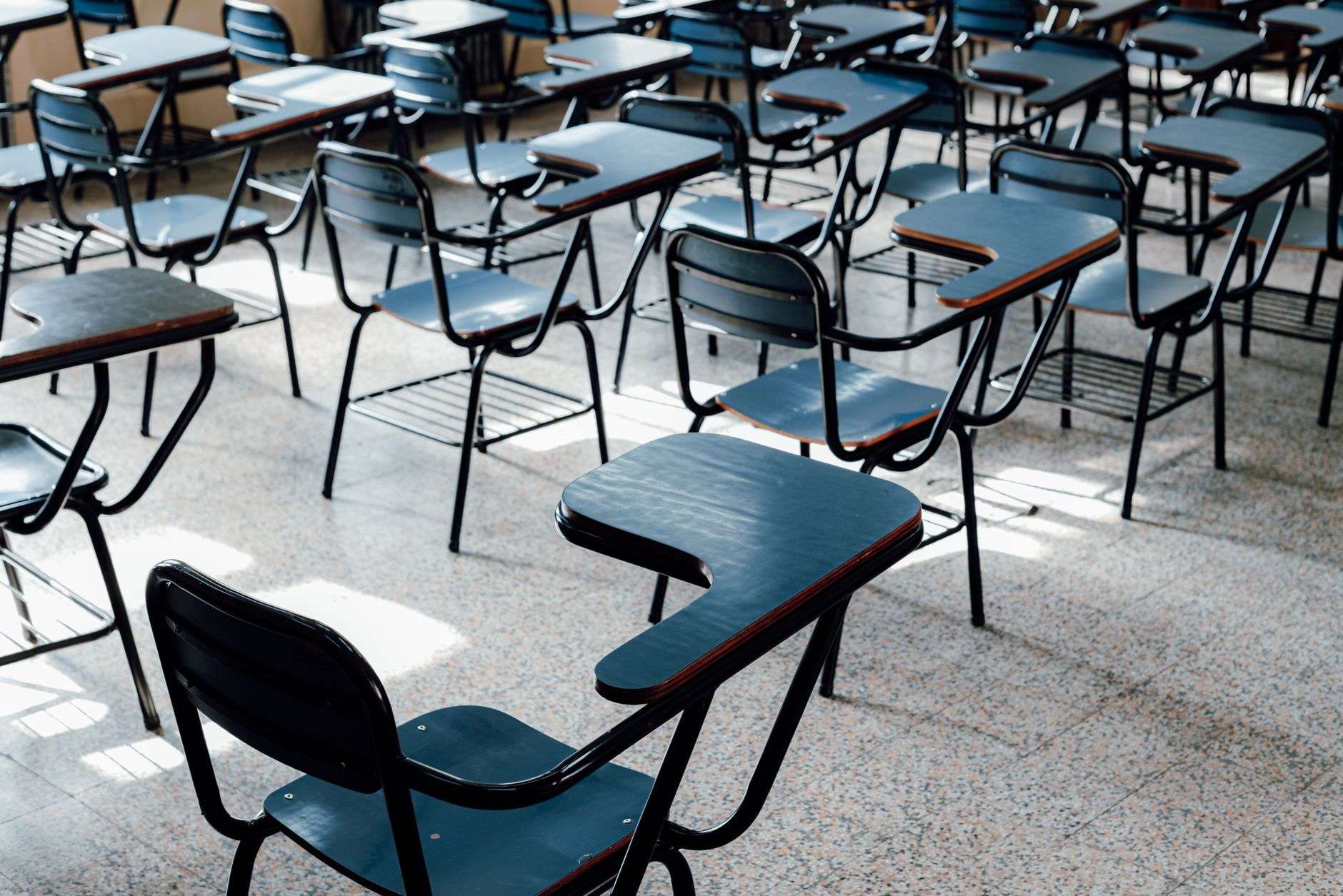 Student desks in a classroom