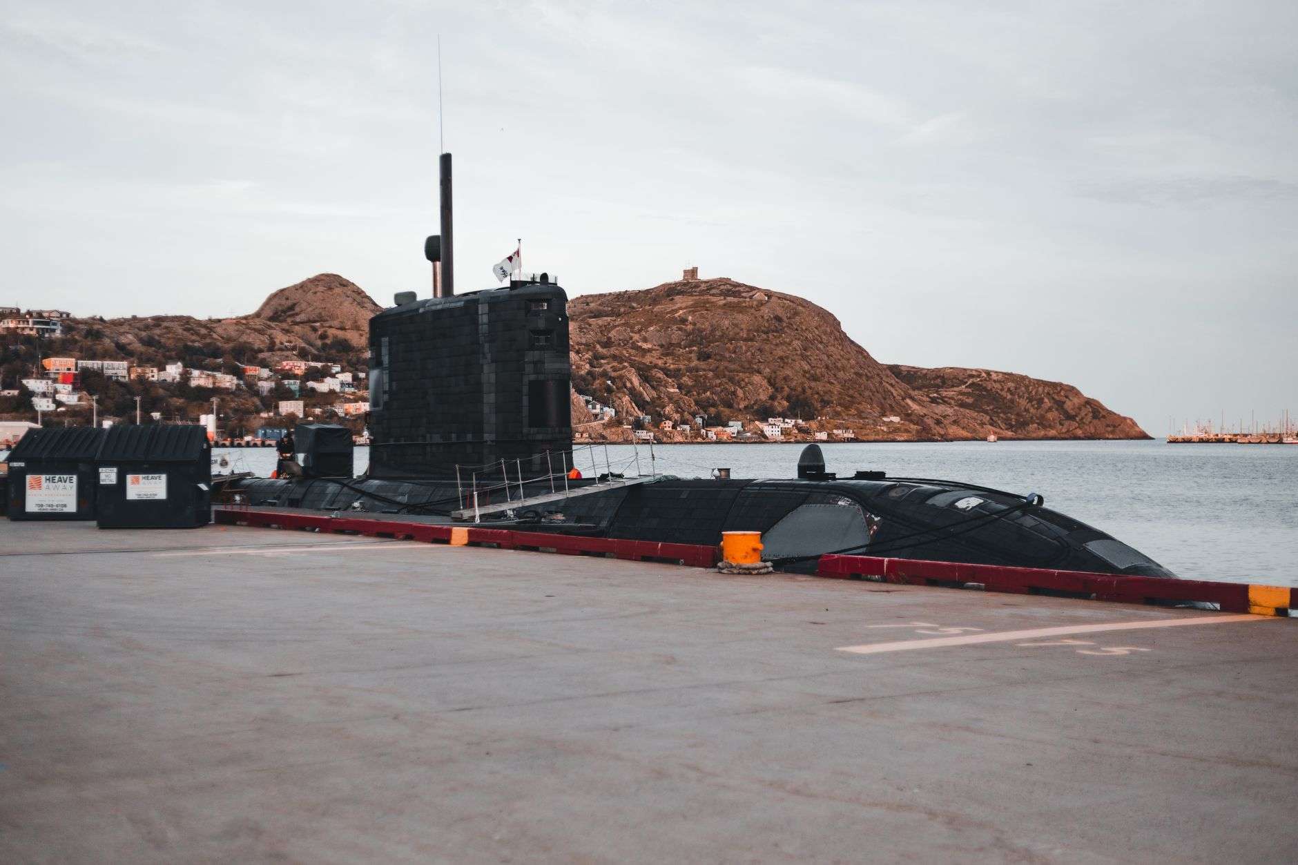 A United States Navy submarine on the surface of the ocean