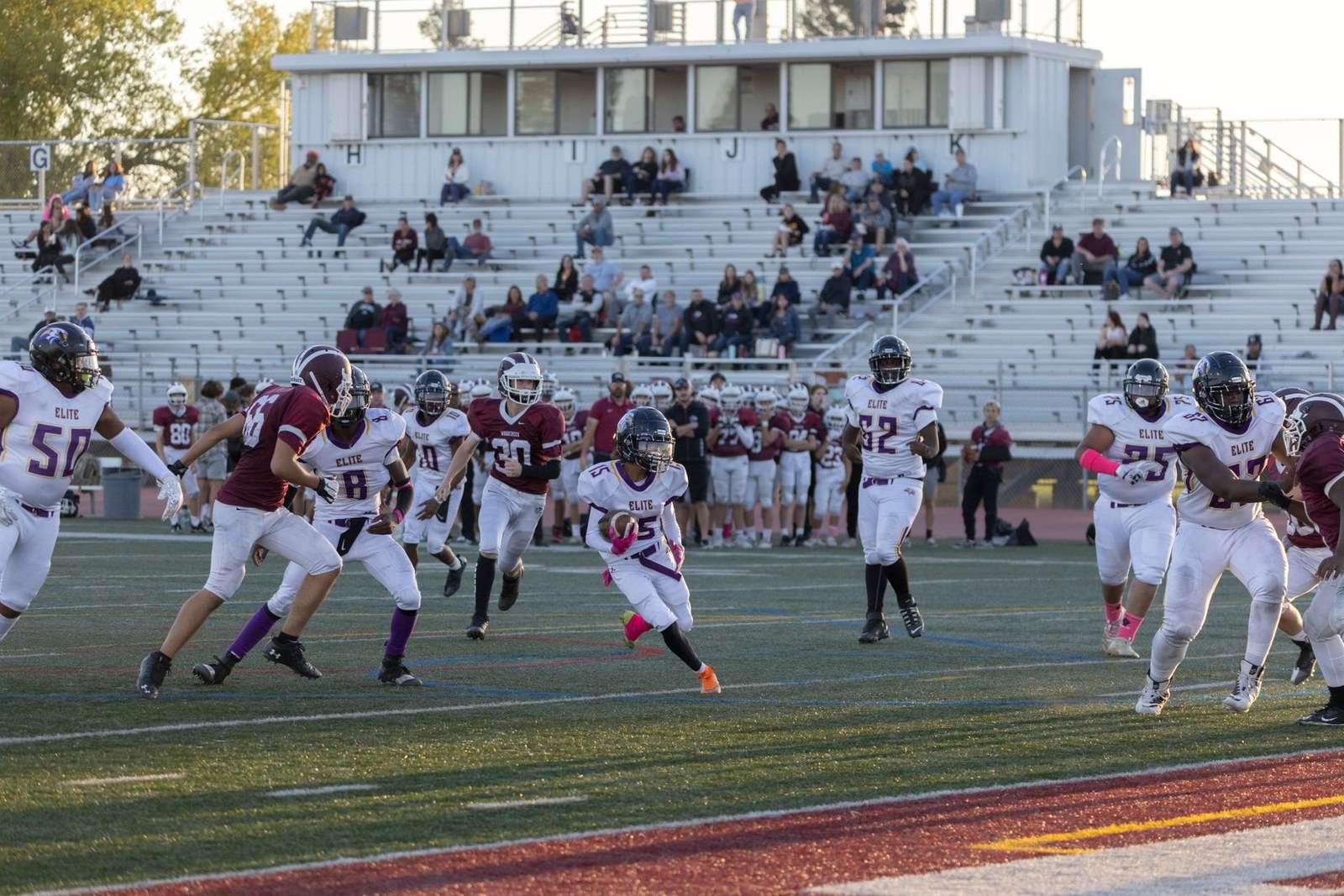 A football quarterback throwing a pass during a game