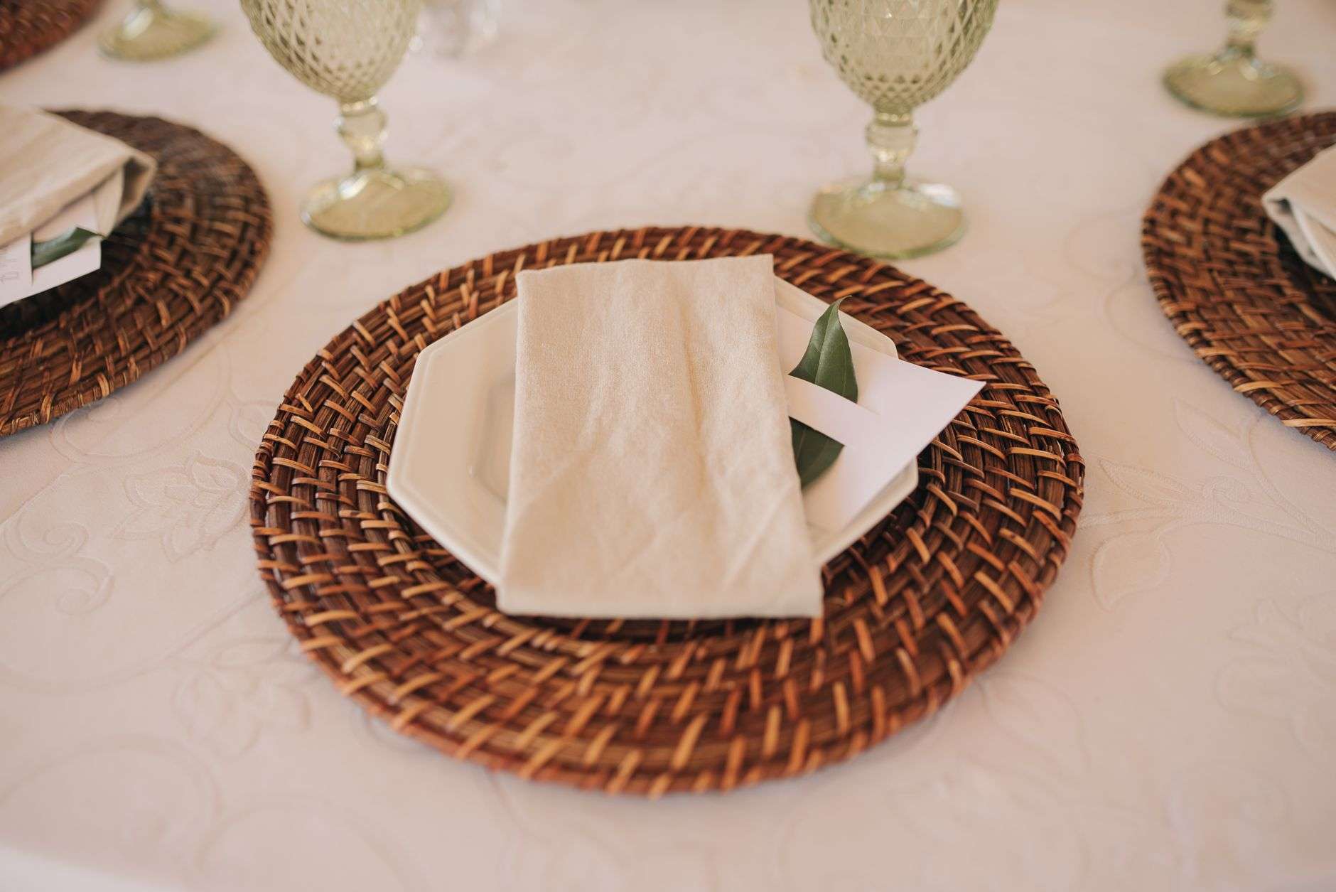 Tables set for a community luncheon in a meeting hall