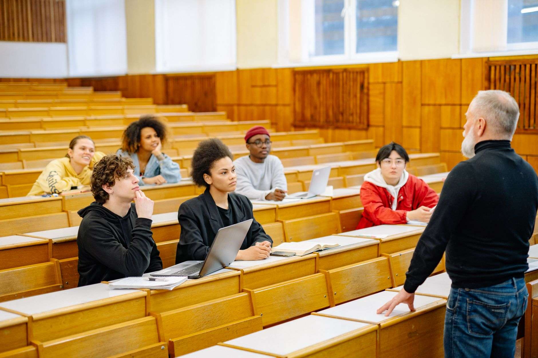 University students in a classroom with a lecturer