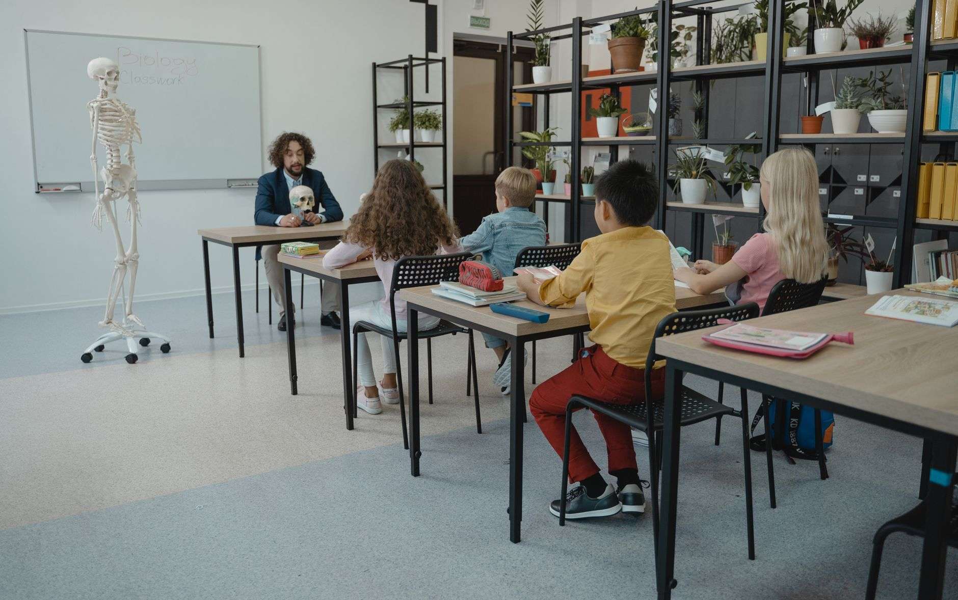 Elementary students working on a science activity in a classroom