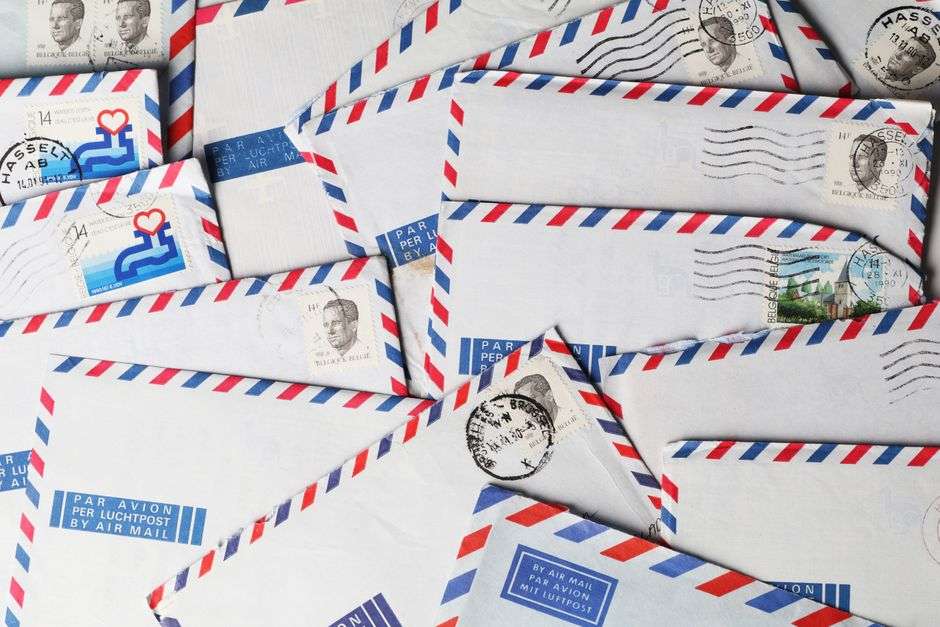 Stacks of letters and envelopes of undelivered mail