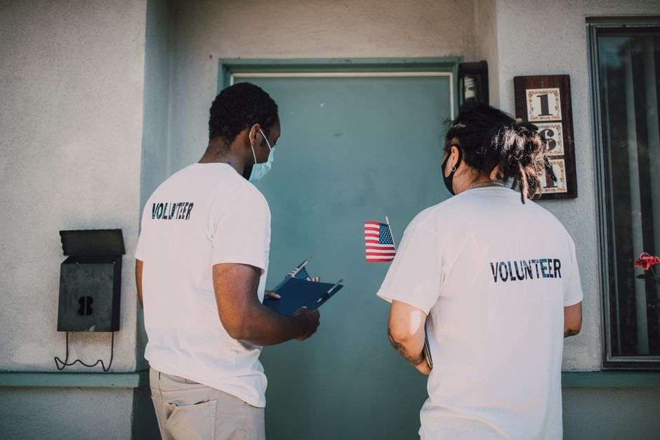 Volunteers working together at a community event