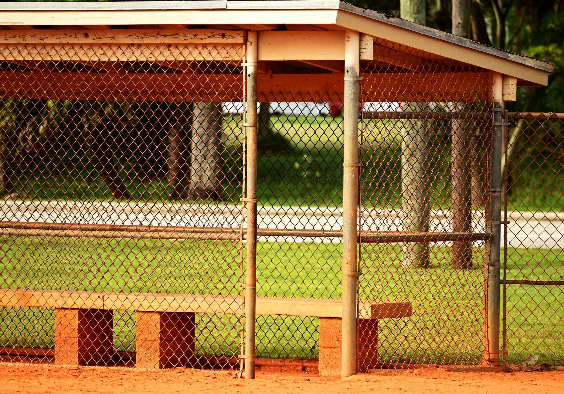 An empty youth softball field, illustrating a community park facility maintained by a volunteer organization