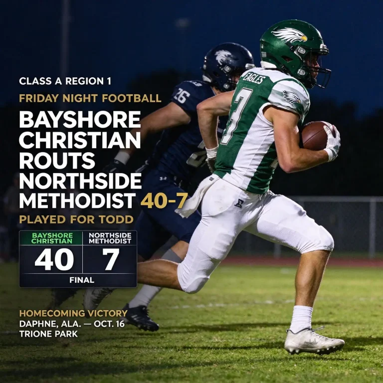 High school football running back carrying the ball through an opening in the line during a night game