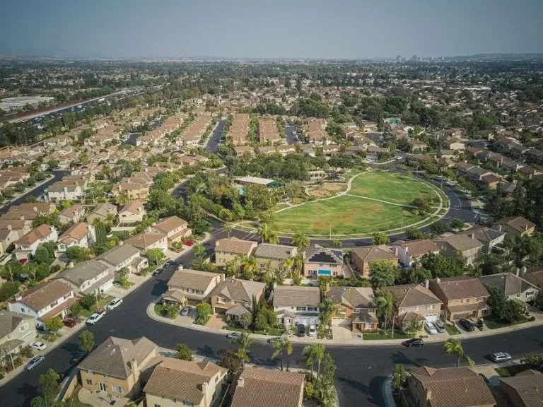 Aerial view of a suburban neighborhood with streets and rooftops similar to those being considered for annexation into Mobile