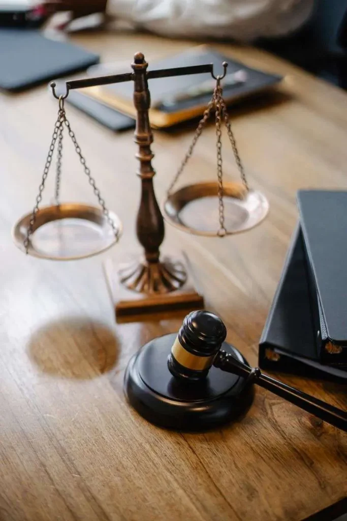 A gavel and scales of justice on a desk