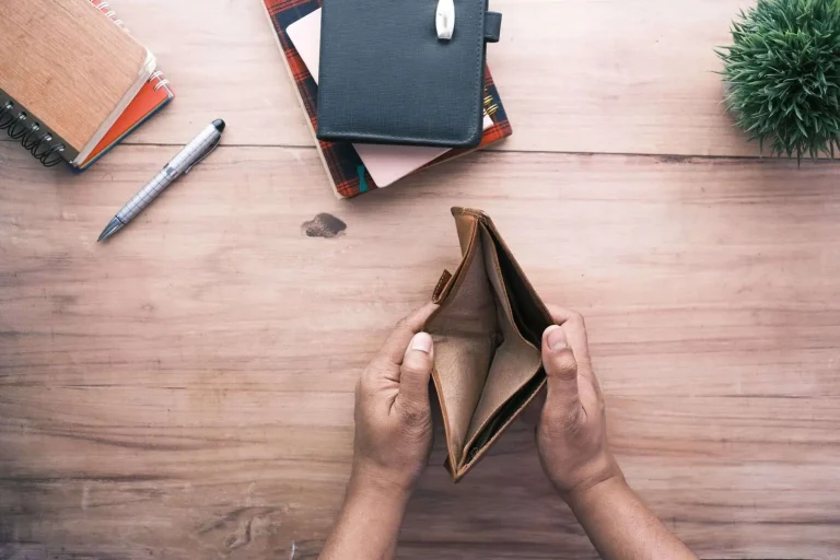 Financial paperwork and a calculator representing a campaign budget