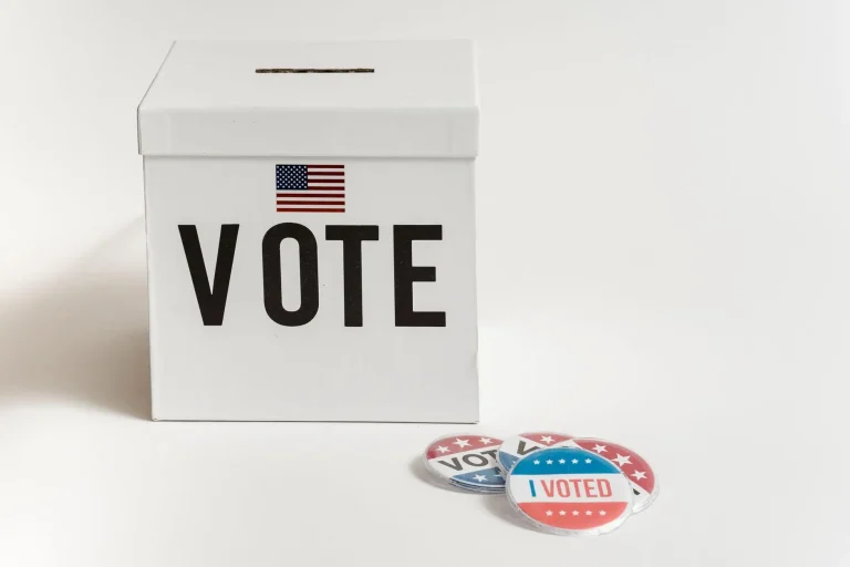 Cash and a ballot box representing campaign finance disclosure in local elections