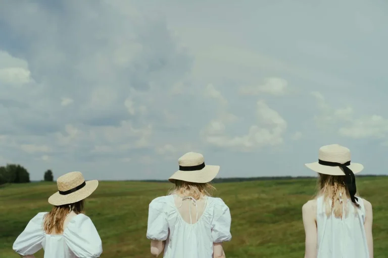 A straw boater hat and white linen jacket, symbols of the Southern spring wardrobe