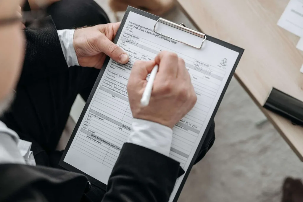 Petition being signed on a clipboard