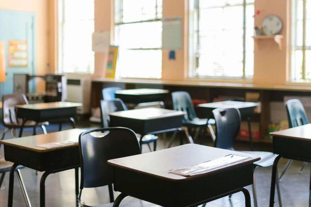 An elementary school classroom with student desks