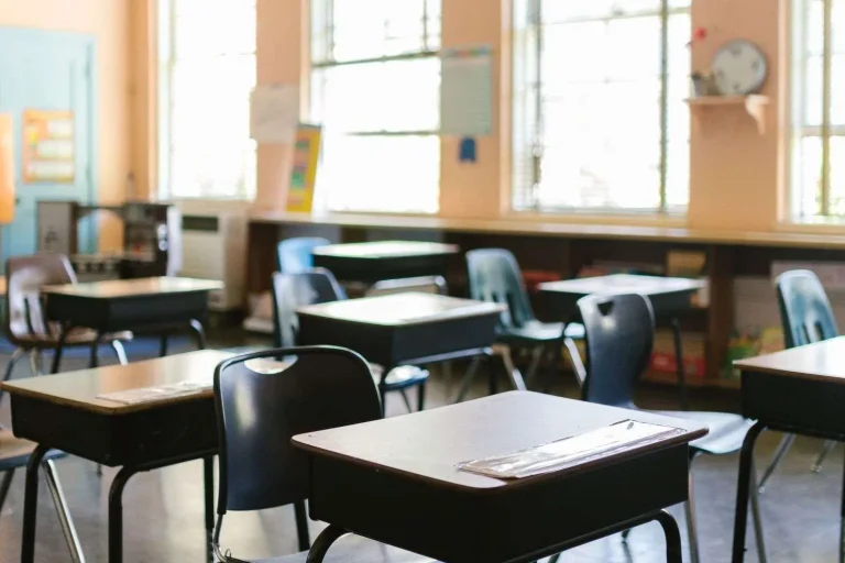 An elementary school classroom with student desks
